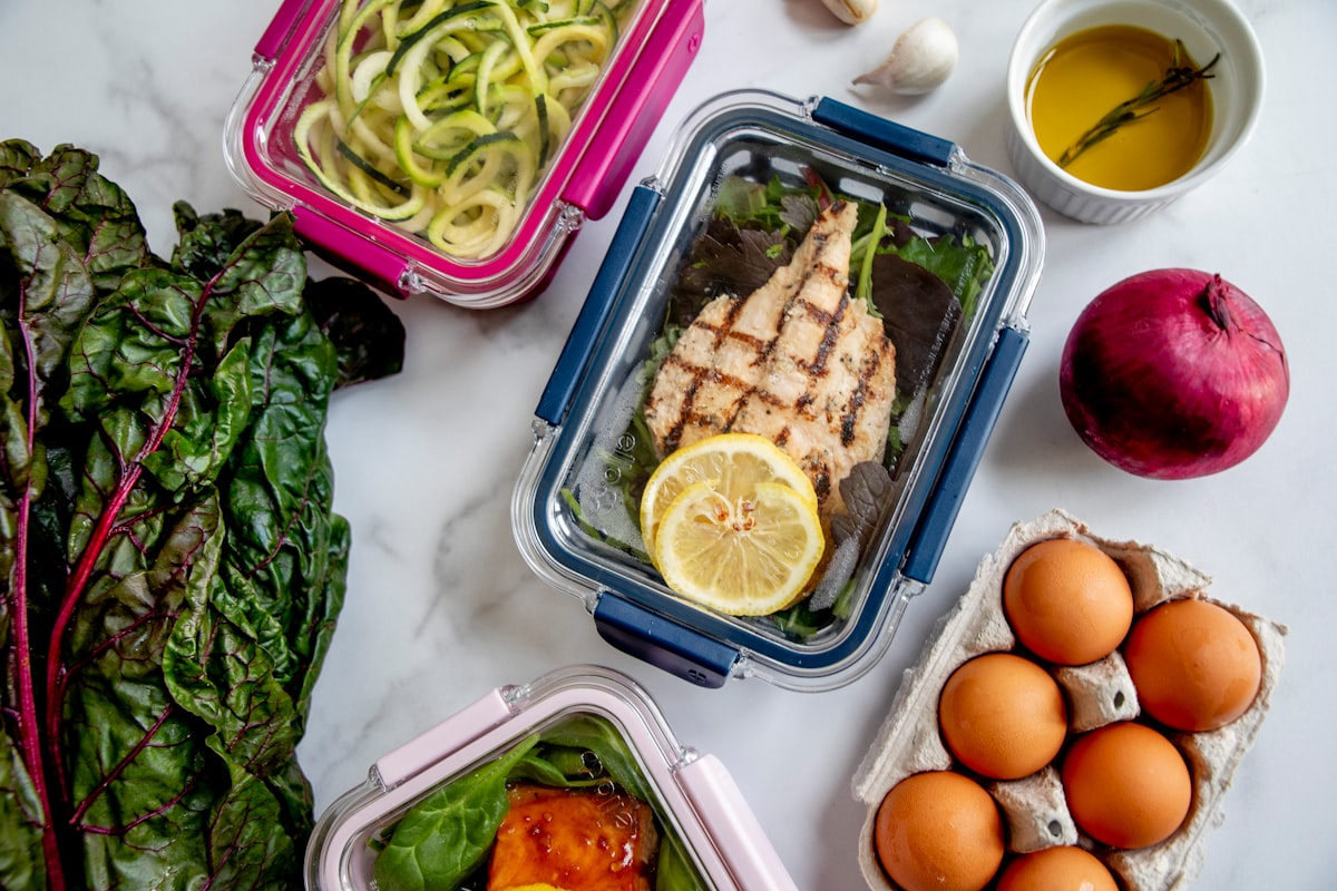 Nutrition planning workspace with healthy foods and planning notebook